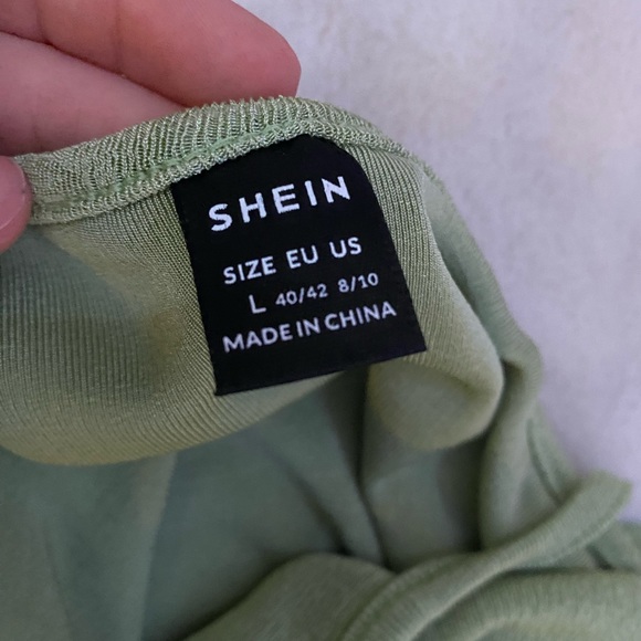 light weight and looks super cute. From shein and is size L. It’s a light green. - Picture 3 of 3